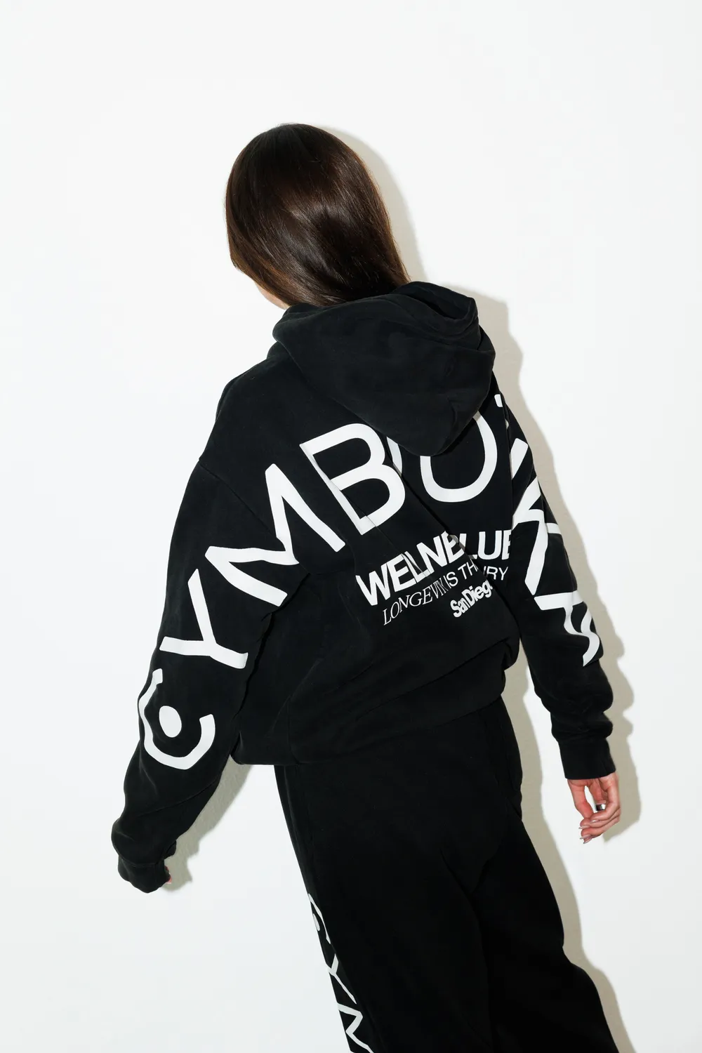 Cymbiotika Wellness Club Hoodie hettegenser faded black unisex
